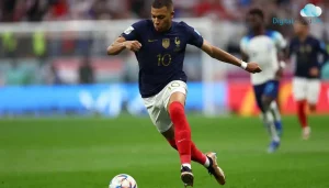 Kylian Mbappe sprinting at full speed with a football