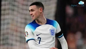 Phil Foden smiling towards audience